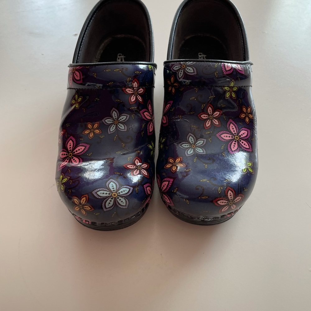 Dansko blue patent flower clogs